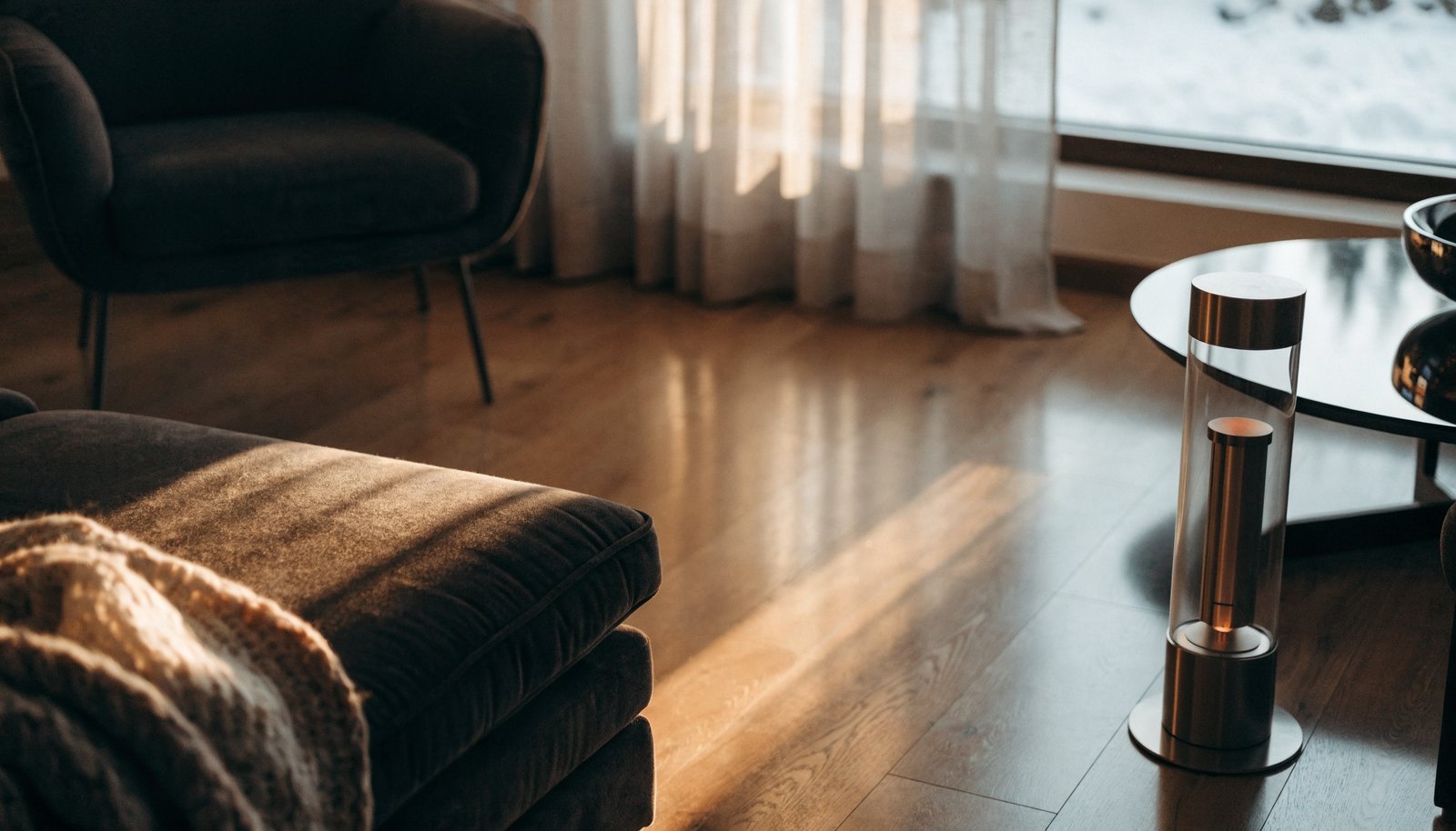 Cozy modern living room warmed by a sleek space heater on a winter evening